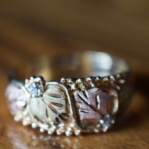 Pretty 10k. Genuine gold and 12k. Black hills gold ring with diamonds.